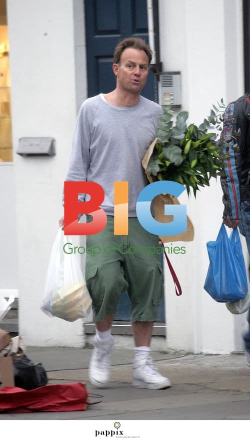 Jason Donovan Shows Expressive Faces in London