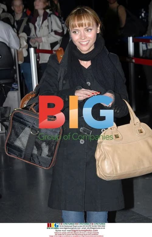 Christina Ricci and dog Ramon arrive at JFK