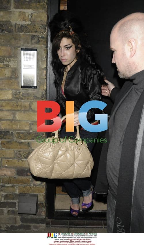 Amy Winehouse Leaves for Fendi Party in Paris