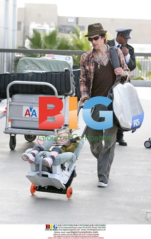 Jane's Addiction Frontman Perry Farrell Departs LAX with Family