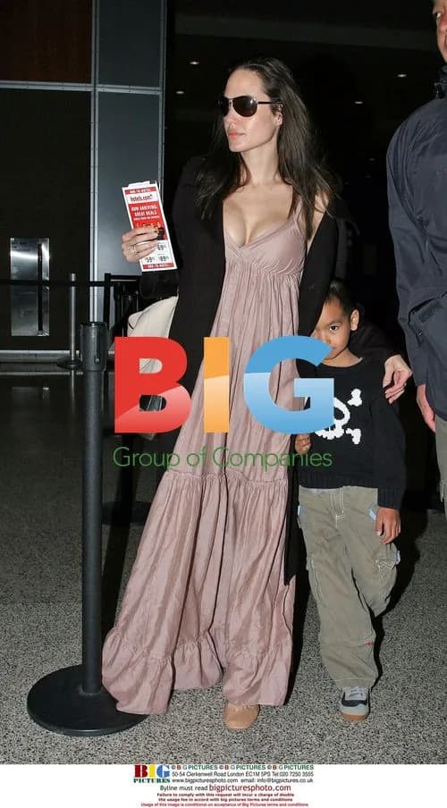 Pregnant Angelina Jolie Departs Austin