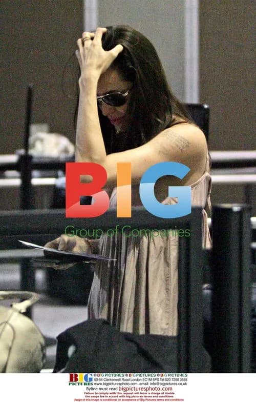 Pregnant Angelina Jolie Departs Austin, Texas