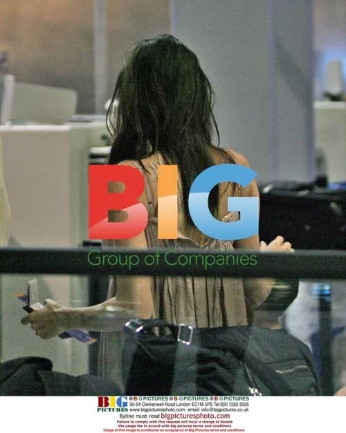 Pregnant Angelina Jolie Departs Texas