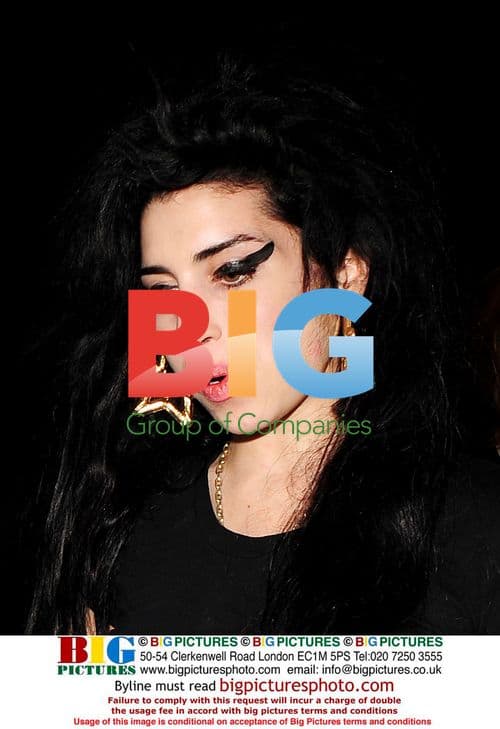 Amy Winehouse stops at off-license after Bungalow 8 party