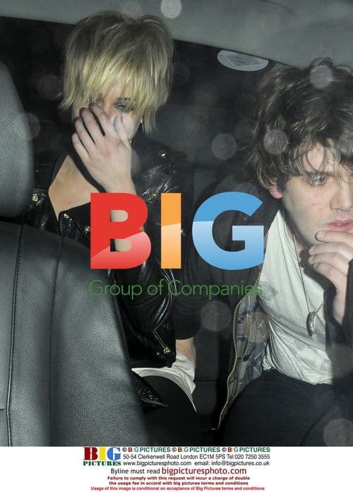 Kimberly Stewart and mystery man at Bungalow 8