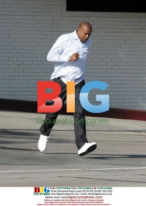 Oscar-winner Forest Whitaker runs across Sunset Boulevard
