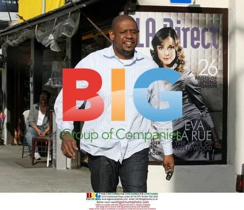 Oscar-winner Forest Whitaker runs across Sunset Blvd