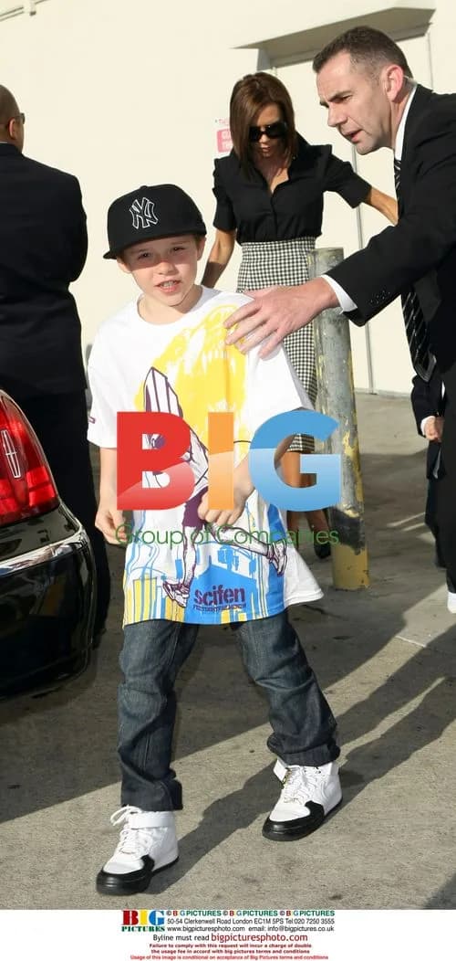 Victoria Beckham takes sons to movie premiere