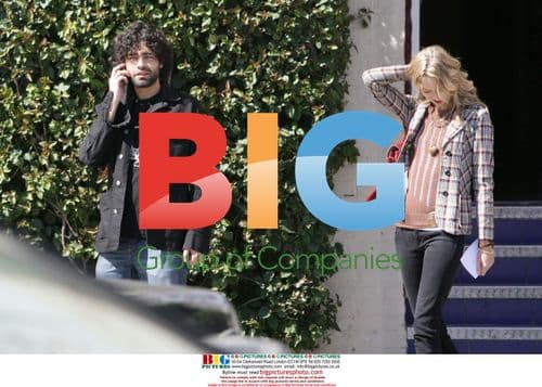 Adrian Grenier and female friend have breakfast