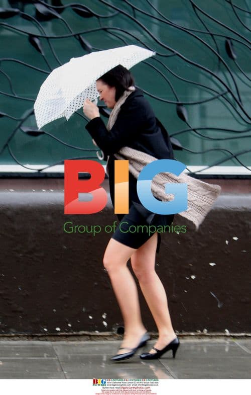 Commuters battle London storm