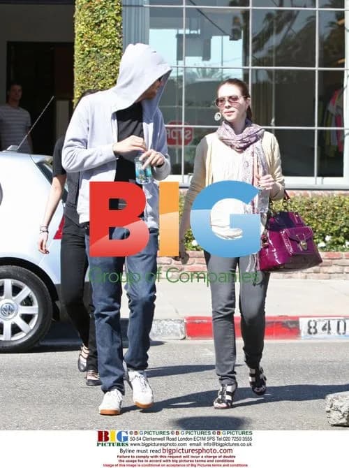 Michelle Trachtenberg shopping with male companion