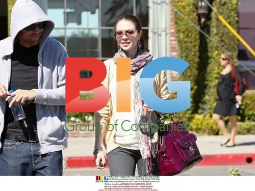 Michelle Trachtenberg shopping with companion