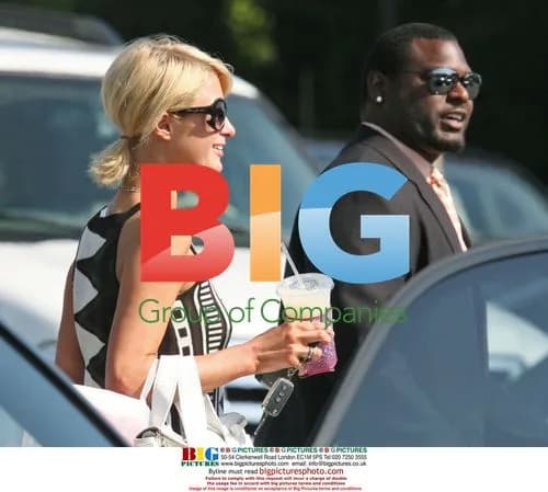 Paris Hilton Shops with Bodyguards in LA