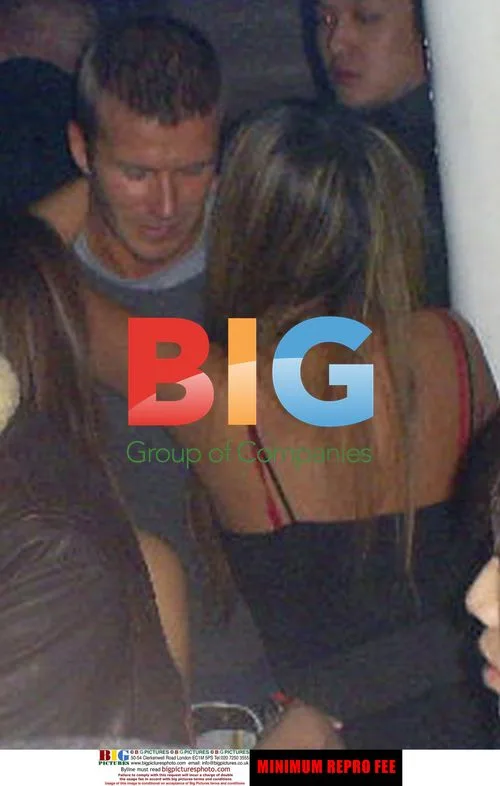 Beckham Tackled by Blonde in Seoul Club