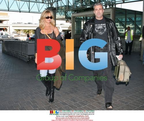 Goldie Hawn at LAX with mystery man