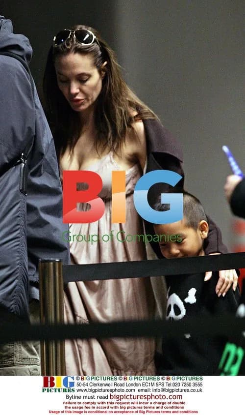 Pregnant Angelina Jolie Departs from Austin, Texas
