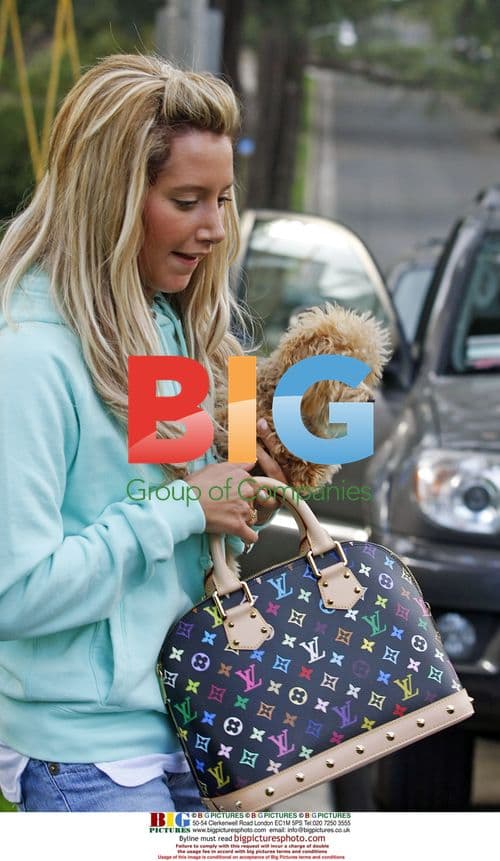 Ashley Tisdale visits Coffee Bean in Porsche