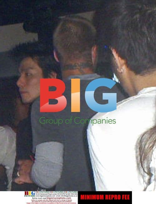 David Beckham tackled by blonde in Seoul