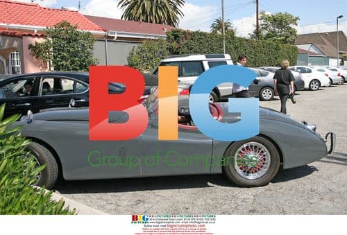 Patrick Dempsey Checks Damage to Porsche