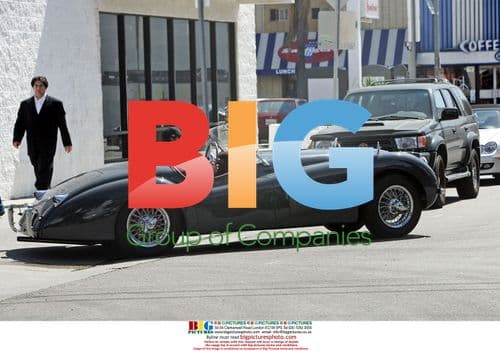 Patrick Dempsey Drives Home in Jaguar and Porsche