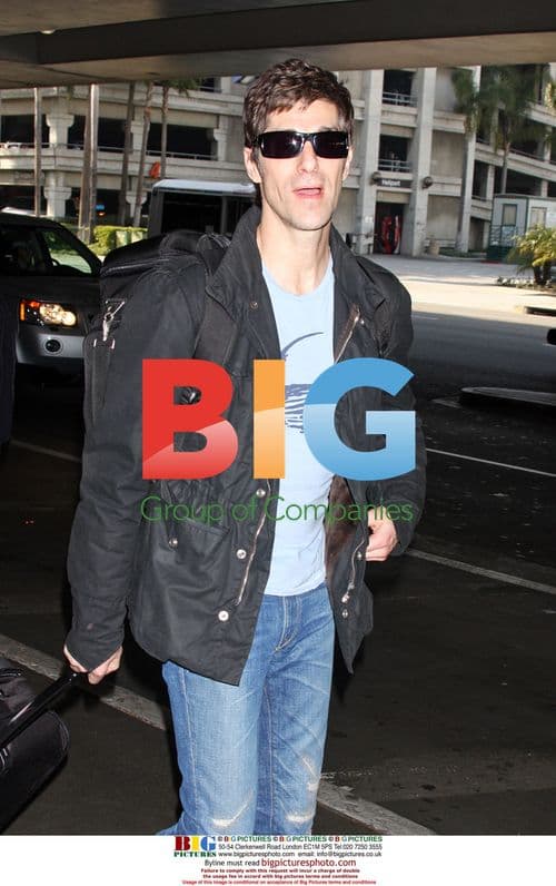 Perry Farrell and wife Etty Lau at LAX