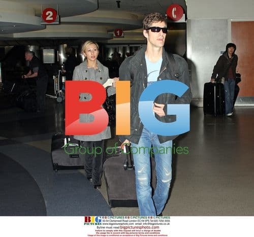 Perry Farrell and wife Etty Lau at LAX