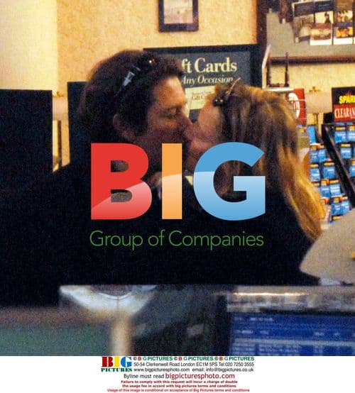 Uma Thurman and Arpad Busson Kissing in Bookstore