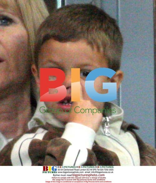 Victoria Beckham with family at soccer match