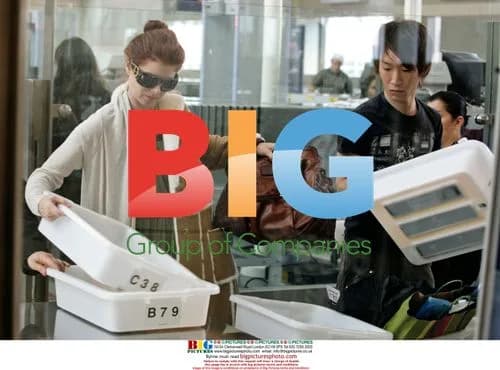 Debra Messing Departs LAX