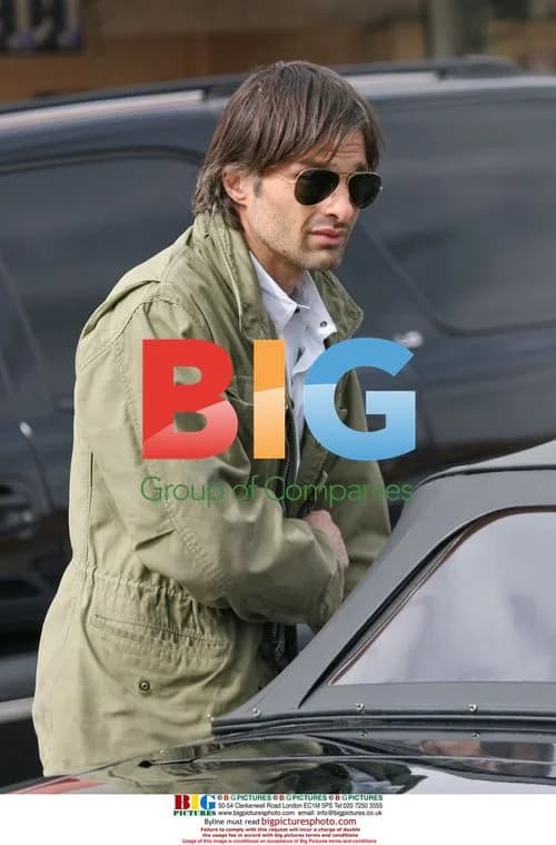 Olivier Martinez Picks Up Newspaper