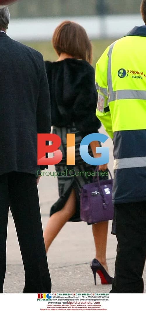 Victoria Beckham and Kids Arrive in Paris
