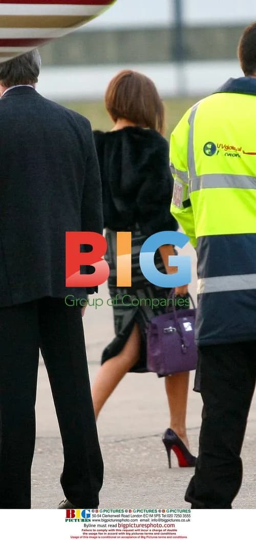Victoria Beckham and Kids Arrive in Paris