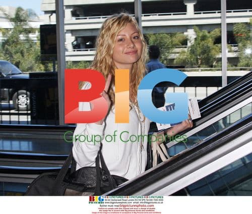 Aly Michalka Departs LAX with Dog