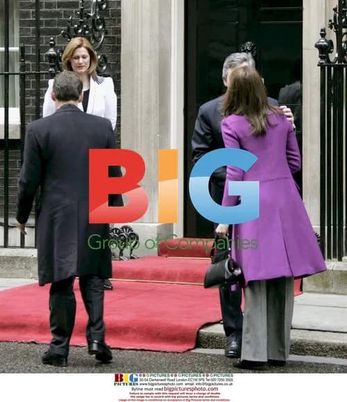 French President Sarkozy and First Lady Bruni-Sarkozy Meet UK PM Brown