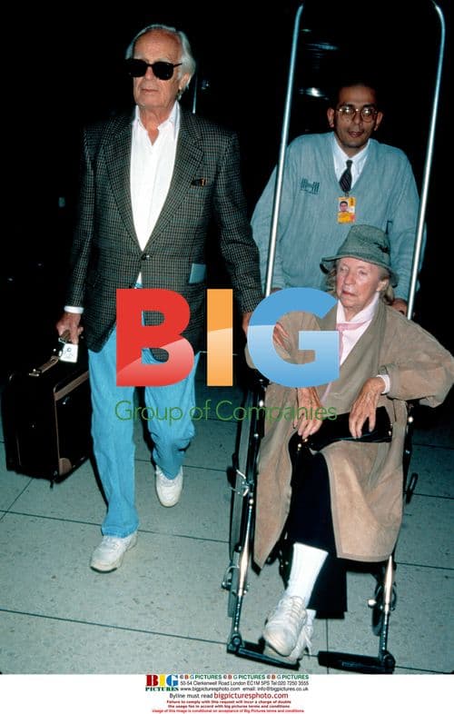 Richard Widmark Departs LAX with Wife