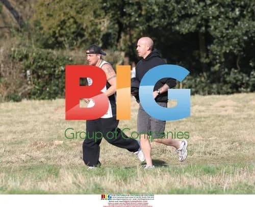 Peter Andre Jogs with Trainer