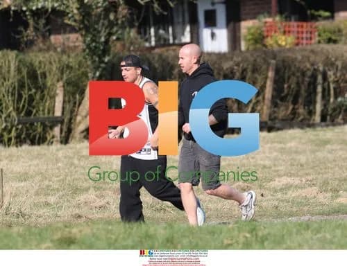 Peter Andre Jogging With Trainer