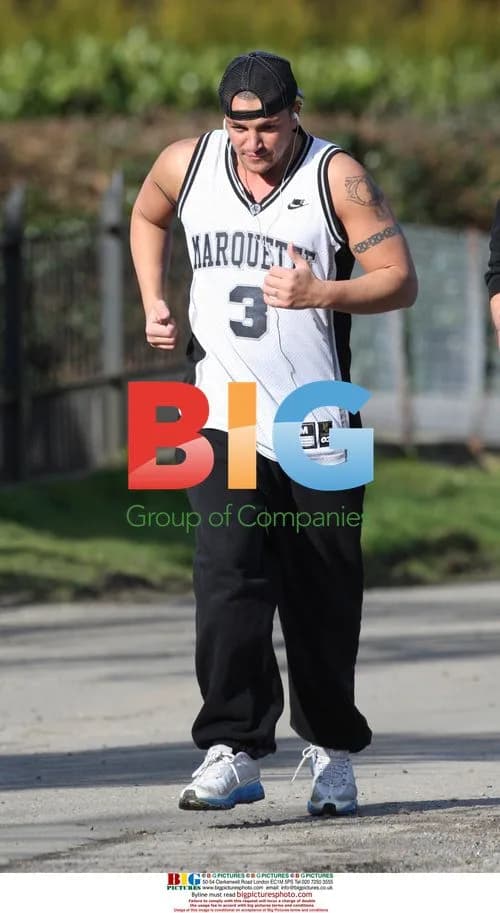 Peter Andre Jogging with Trainer