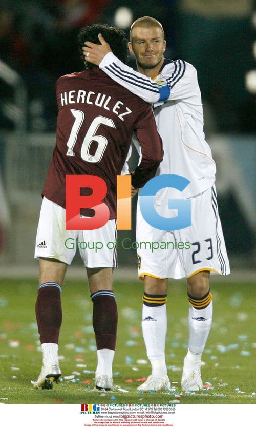 David Beckham embraces Herculez Gomez