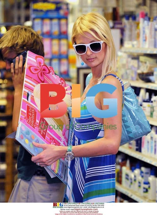 Paris Hilton Flashes Engagement Ring