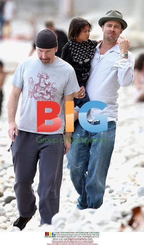 Angelina Jolie and Brad Pitt on Family Beach Walk
