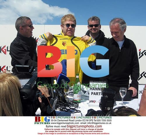 Elton John holds Watford shirt in Ischgl