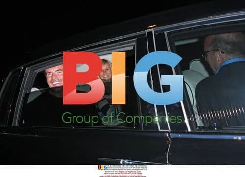 Simon Cowell leaves Ago with mystery woman