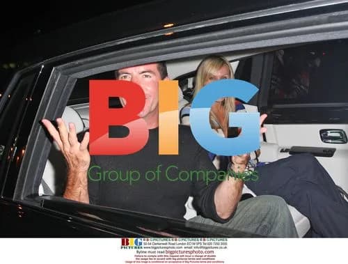 Simon Cowell Leaves Ago With Mystery Blonde