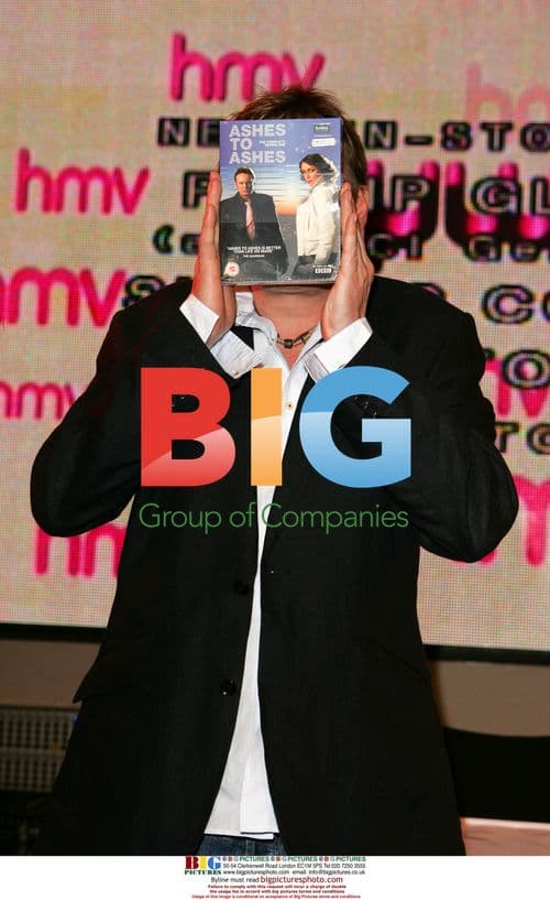 Phil Glenister signs "Ashes To Ashes" DVD