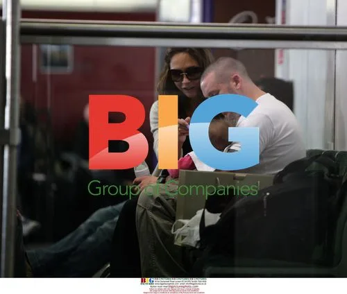 Myleene Klass with partner and baby at Heathrow