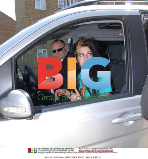 Amy Winehouse Arrives at Police Station