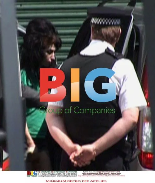 Amy Winehouse Arrives at Police Station