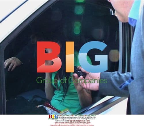 Amy Winehouse Arrives at Police Station