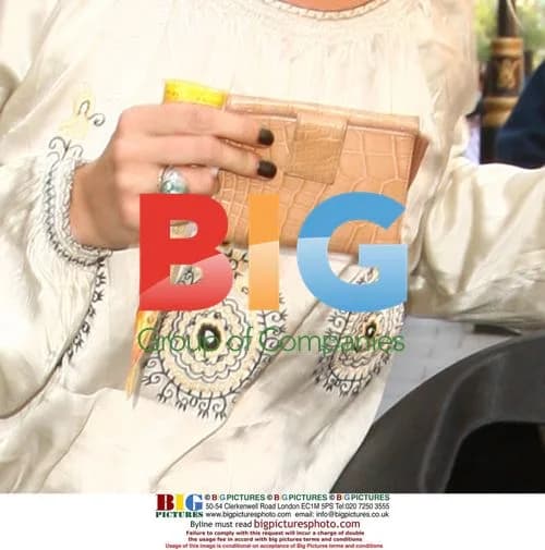 Model Kate Moss grabs ice lolly in London